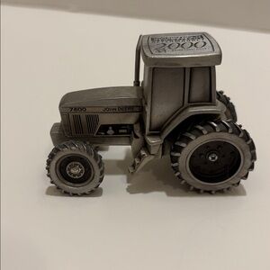 Spec Cast pewter John Deere model 7800 tractor.  With original packaging.